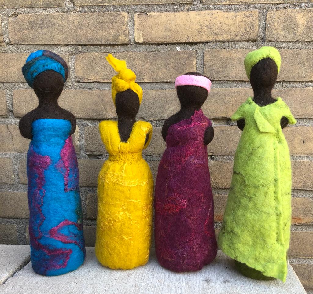 Wollige creaties, de afrikaanse vrouwen
